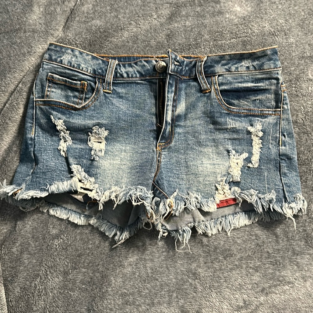 Jean shorts with red white and blue pockets